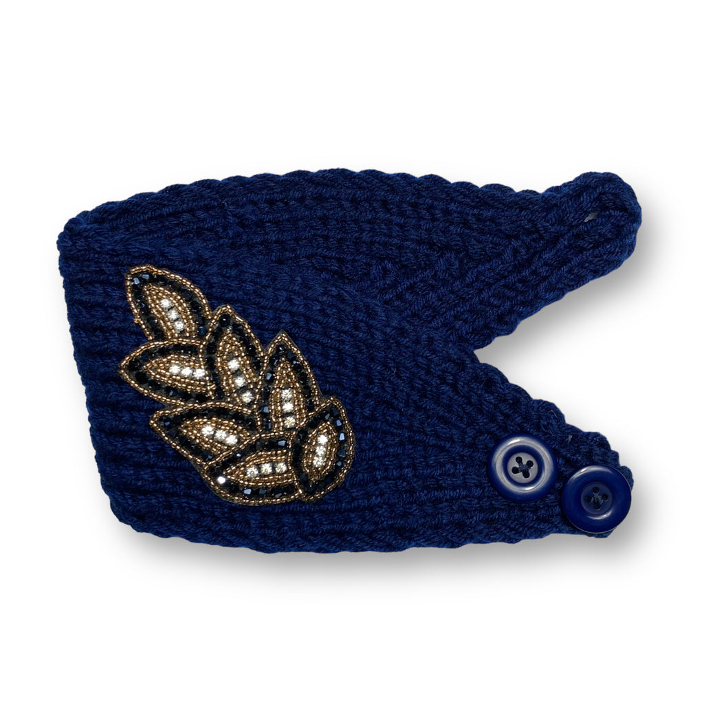 Women's winter knit wool headband designed as an ear warmer turban hat, combining warmth and style for cold-weather outfits.