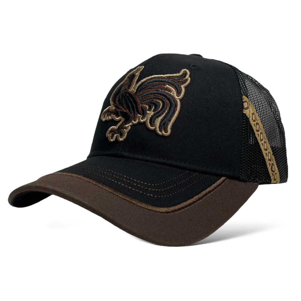 Close-up of embroidered rooster on black snapback trucker hat