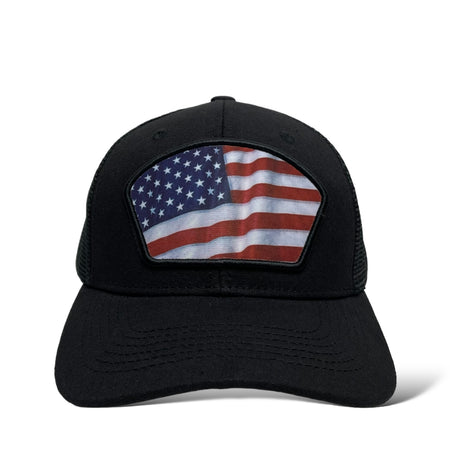 Close-up of printed USA flag patch on black trucker hat