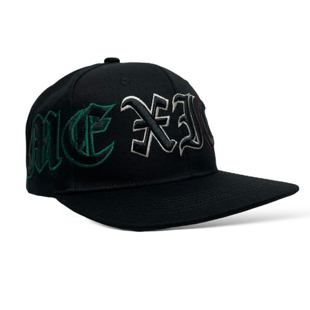 Close-up of 3D Mexico Eagle embroidery on black snapback cap