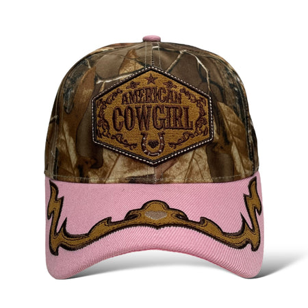 Close-up of American Cowgirl embroidery on pink camouflage baseball cap