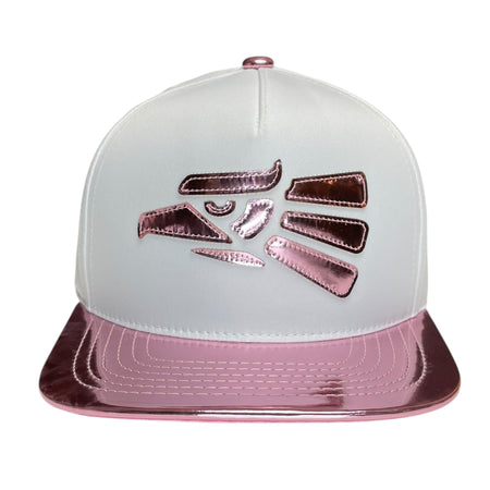 Women's pink vinyl snapback hat with Hecho en Mexico eagle logo and adjustable fit