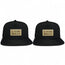Pack of 2 Cash Rules snapback caps with golden dollar sign patch, mesh back, adjustable closure, stylish streetwear design.