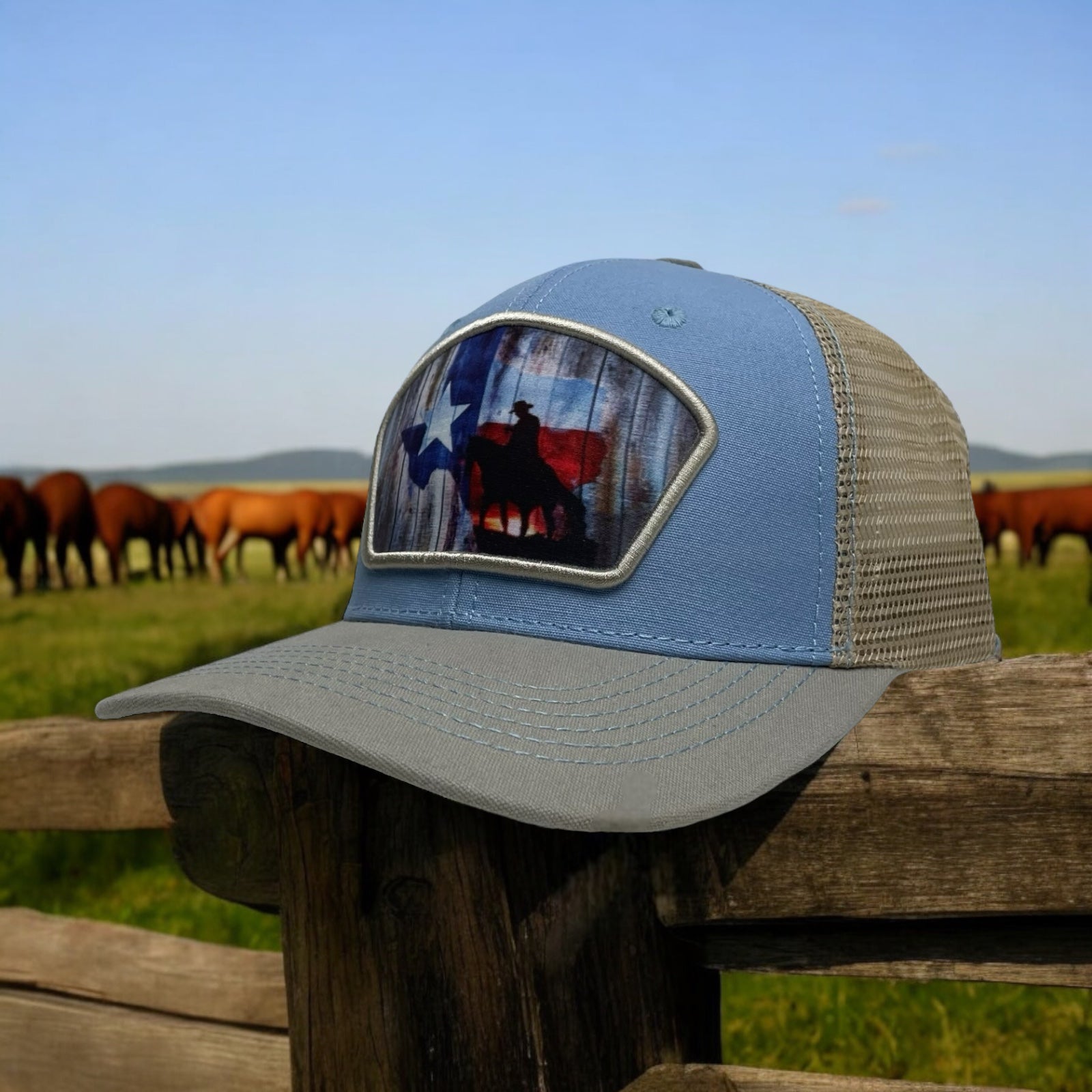 Multi-color snapback trucker hat with cowboy riding a horse and Texas flag patch