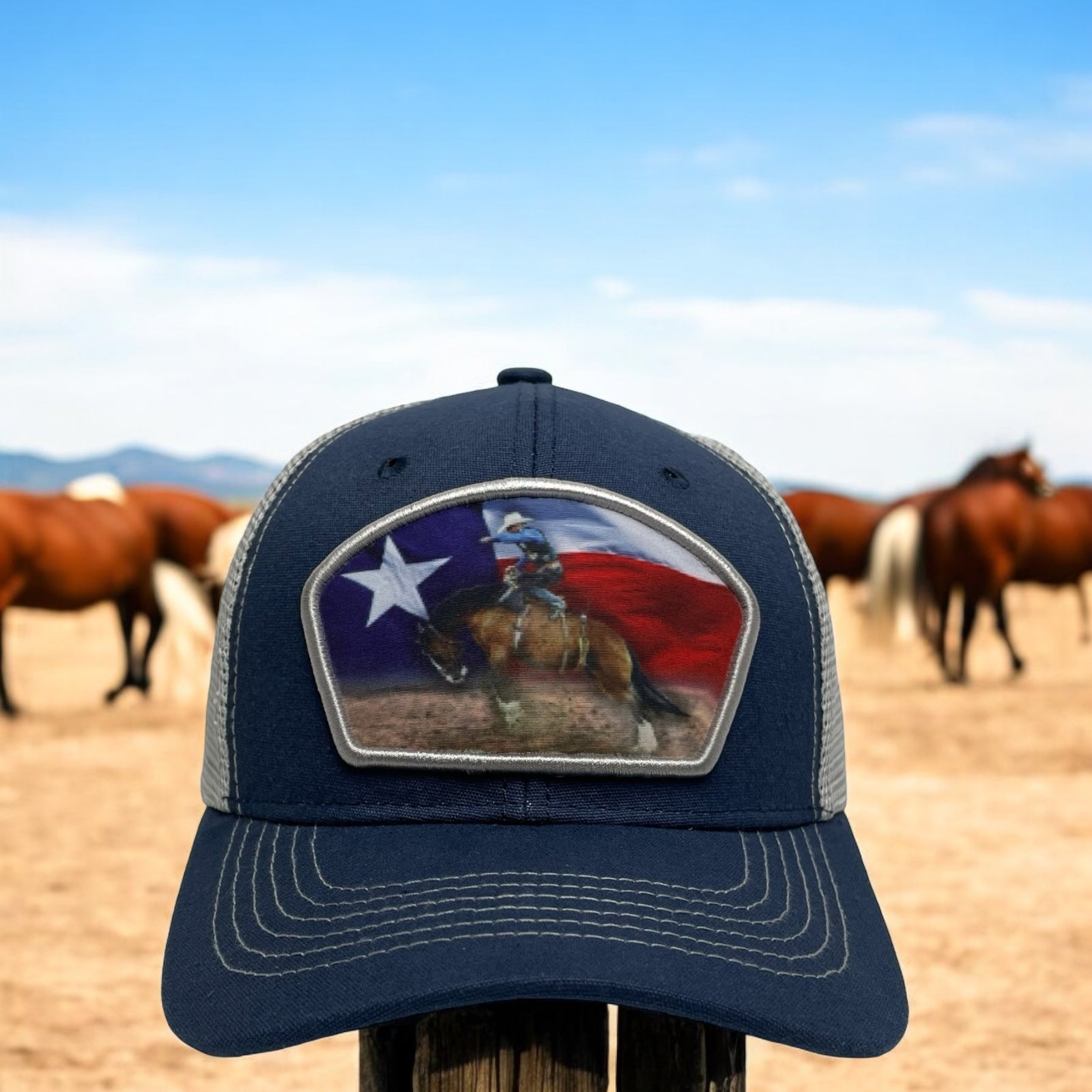 Cowboy bucking bronco snapback trucker hat in Navy and White with Texas flag patch