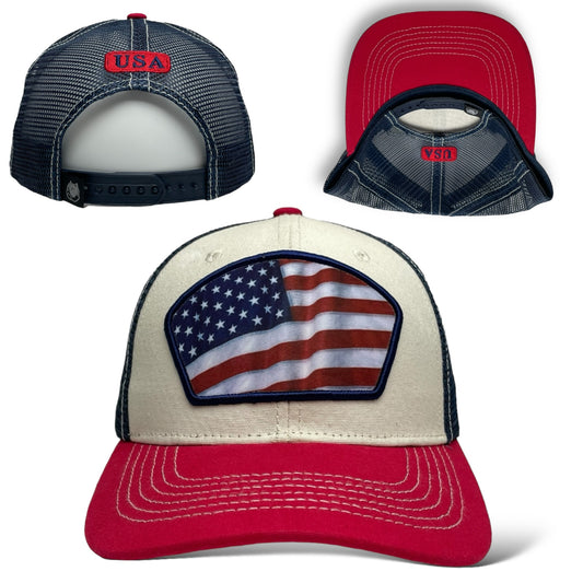 trucker-style snapback cap with a printed American USA flag patch on the front, flat brim, and adjustable snapback closure.
