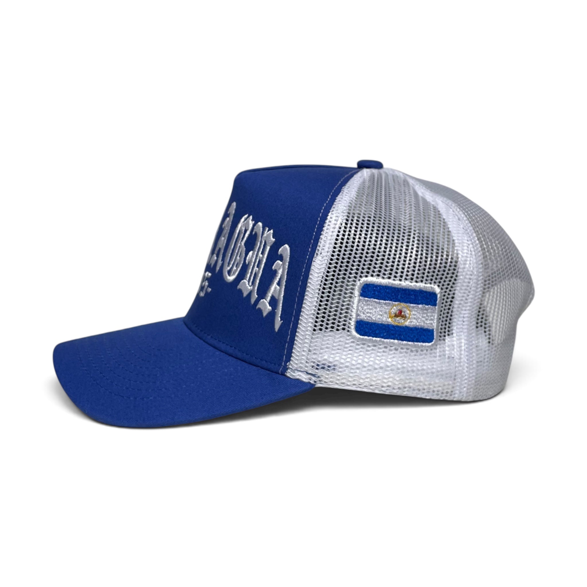 Nicaragua 505 snapback Trucker cap with white front embroidery, Nicaragua flag side patch, curved brim, and adjustable closure.